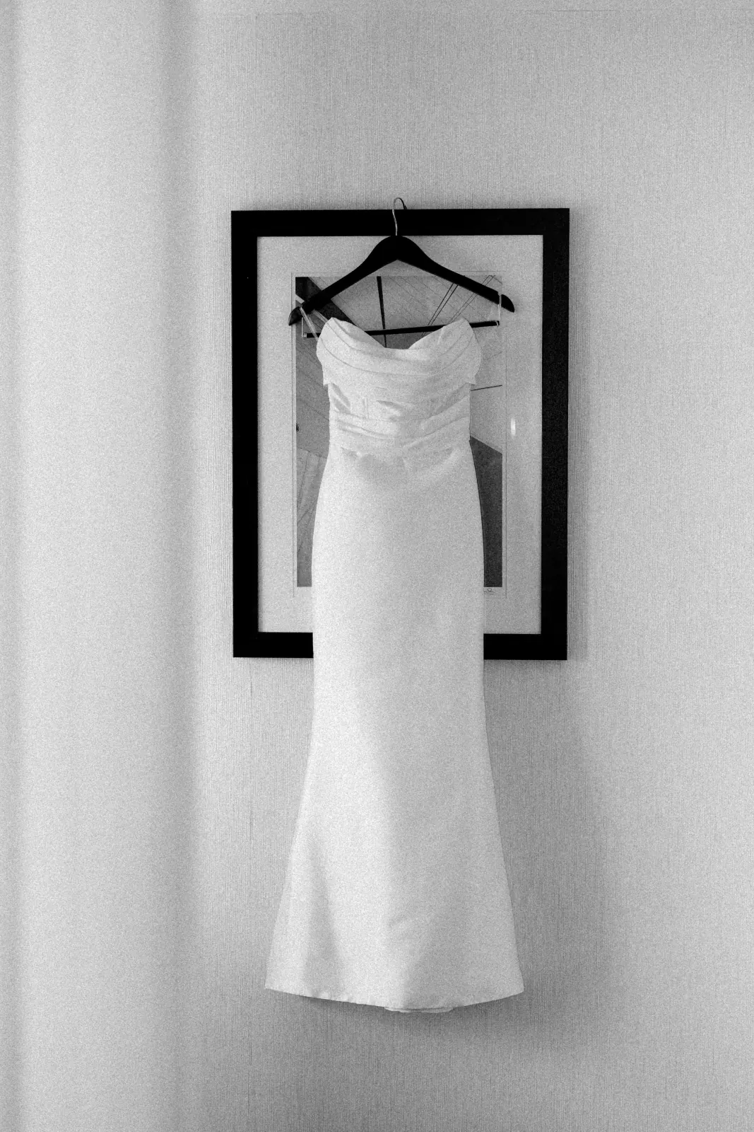 The wedding gown from The White Dress hanging before the ceremony