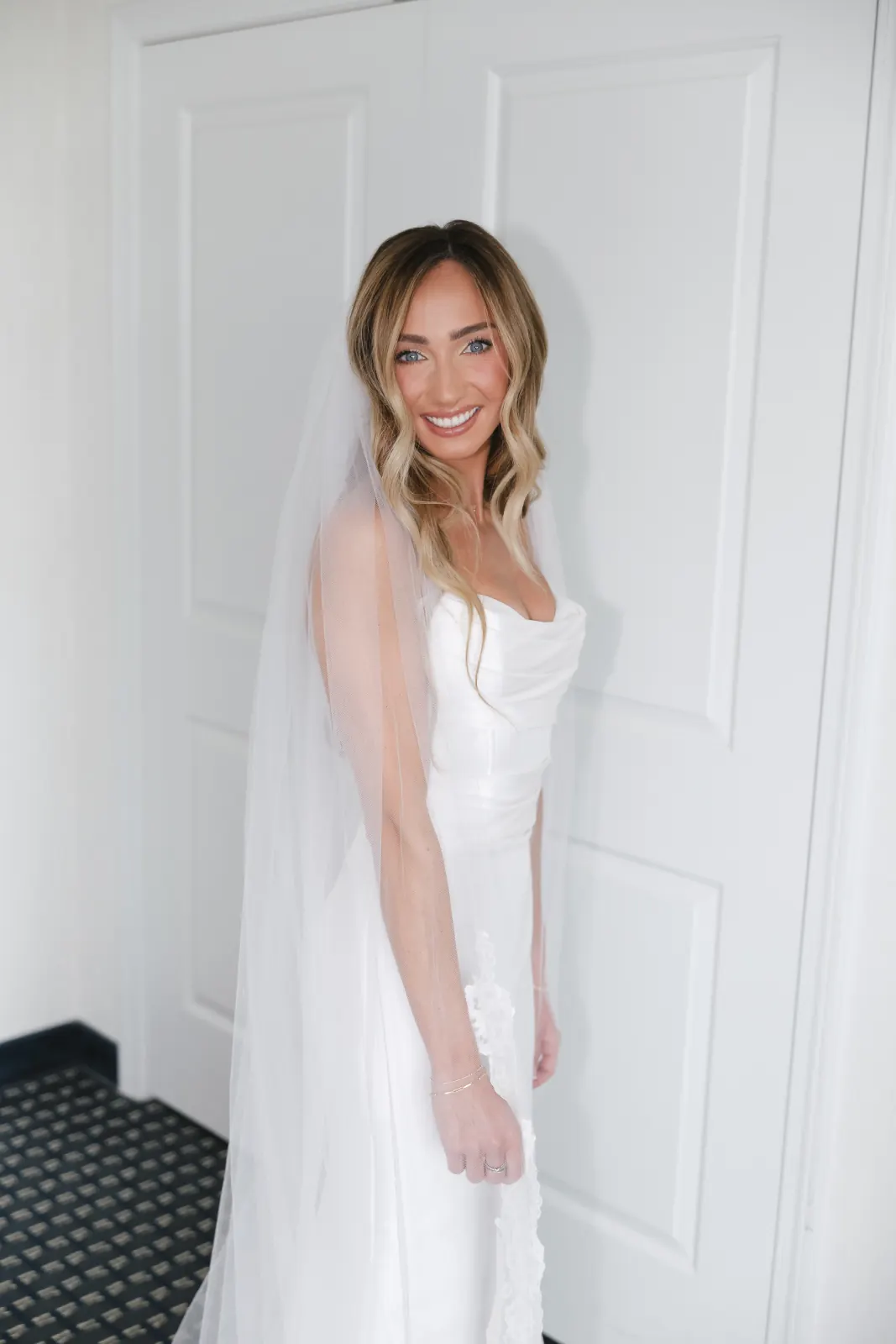 Bride in her gown and veil before the ceremony