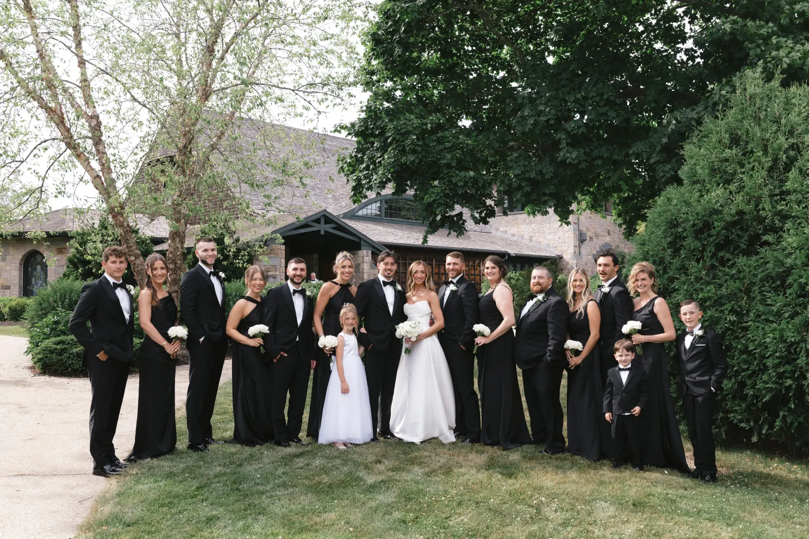 The full bridal party on the lawn at OceanCliff, Newport, Rhode Island