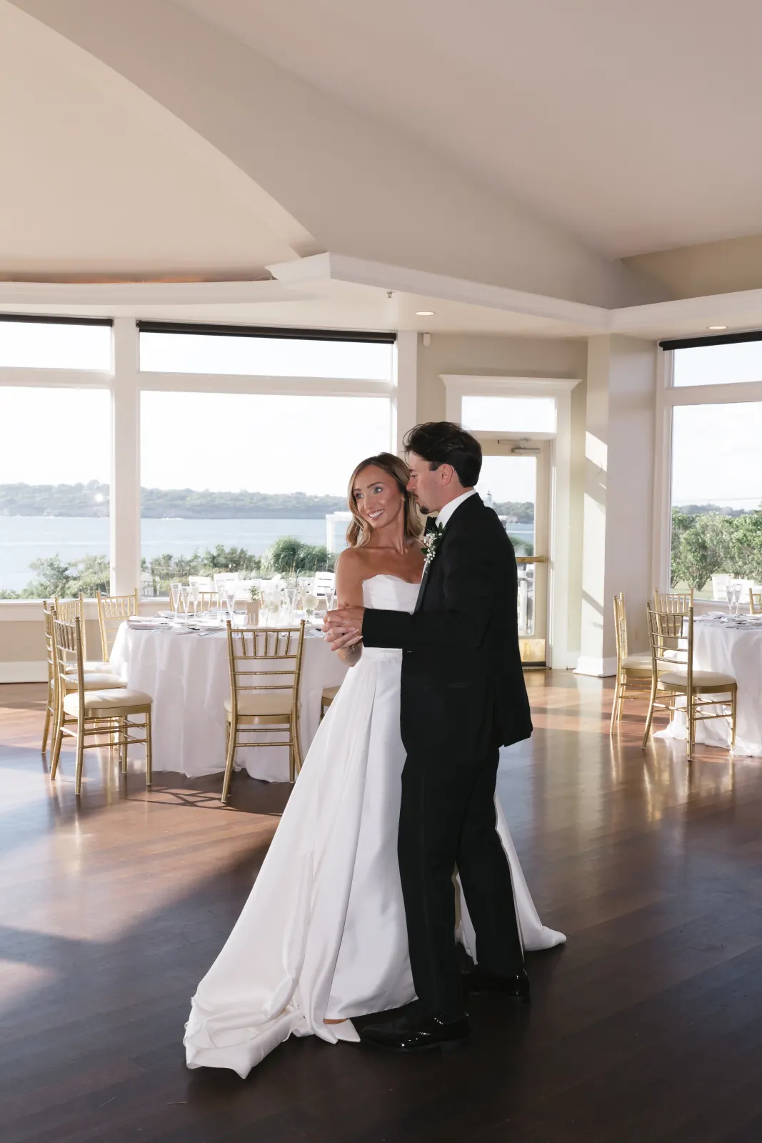 Caite and Sean's first dance in the bay-view ballroom at OceanCliff