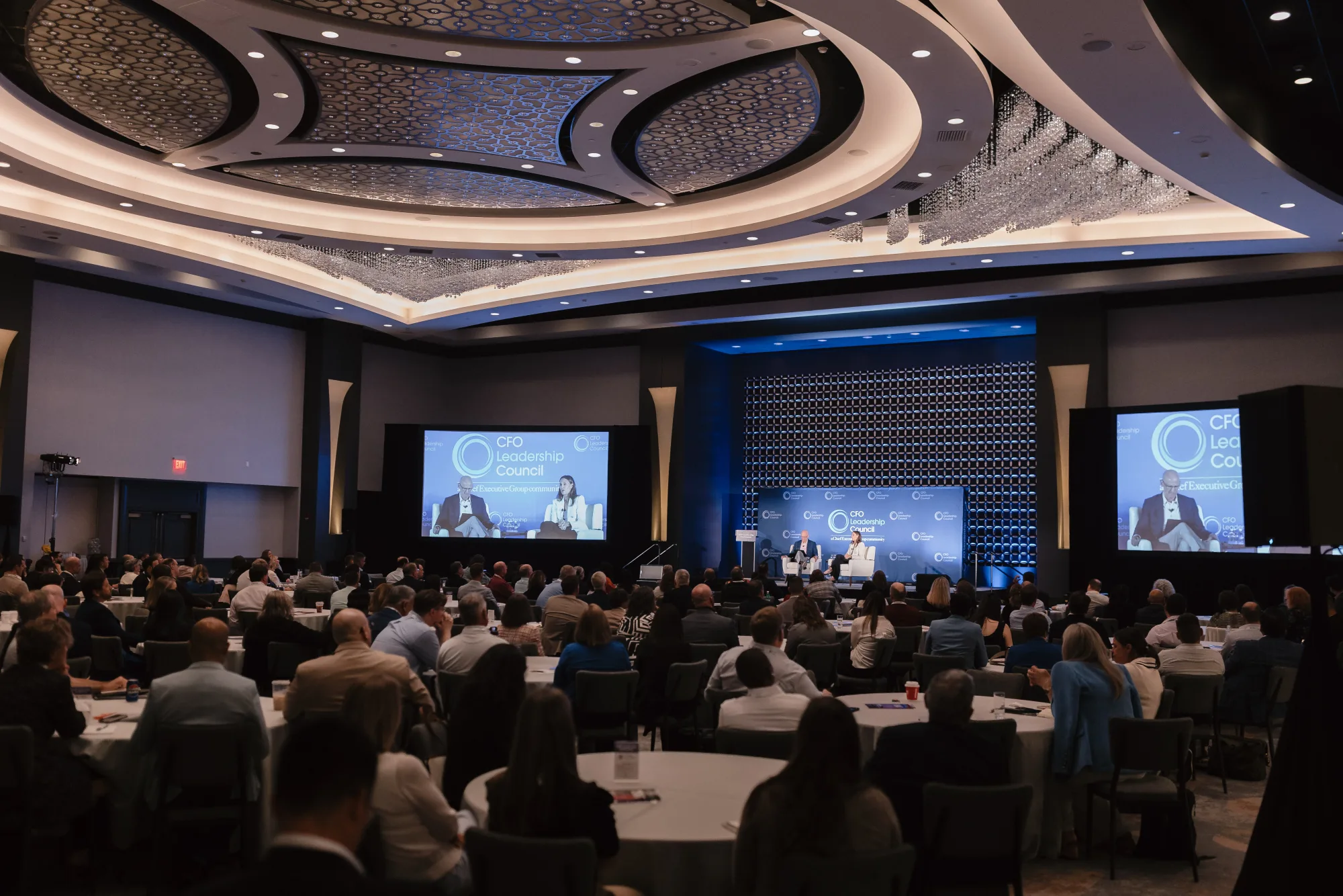 Presentation and audience during a session at the CFO Leadership Conference, Boston Massachusetts