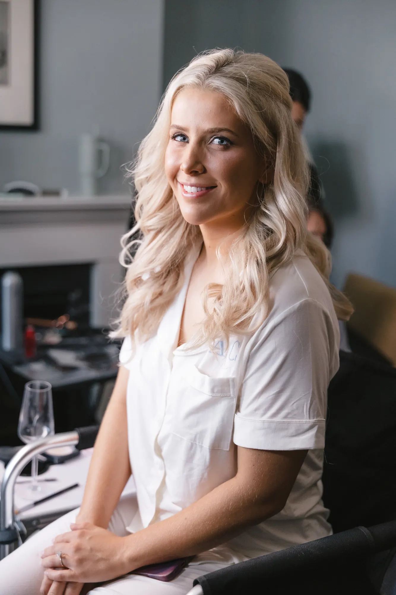 Bride smiles during getting ready at the Beauport Hotel in Gloucester
