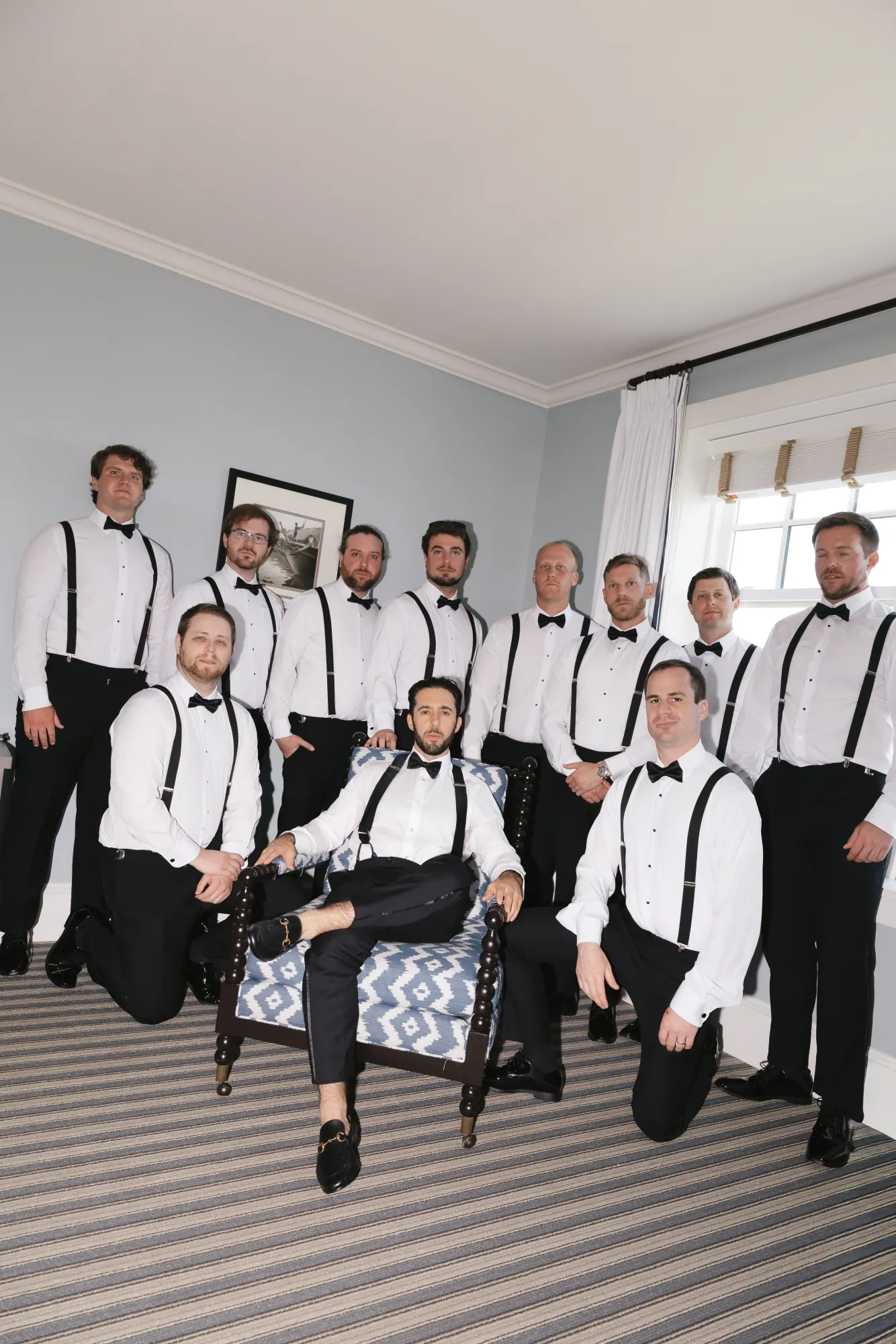 Groom and groomsmen in bow ties and suspenders at the Beauport Hotel