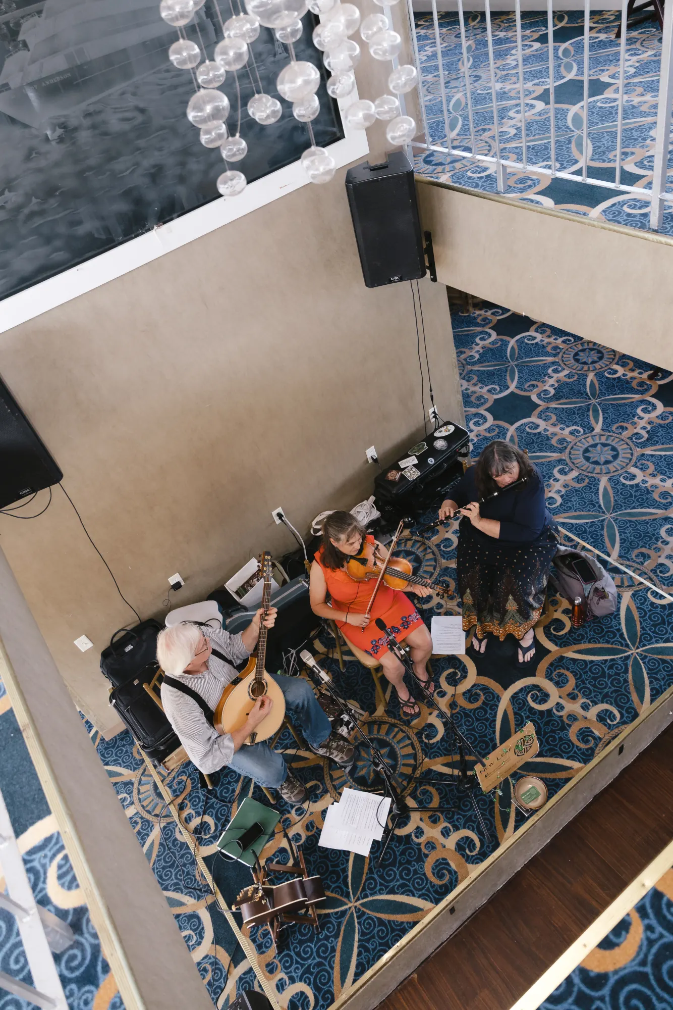 Live musicians play the cocktail hour aboard the Gloucester Harbor cruise