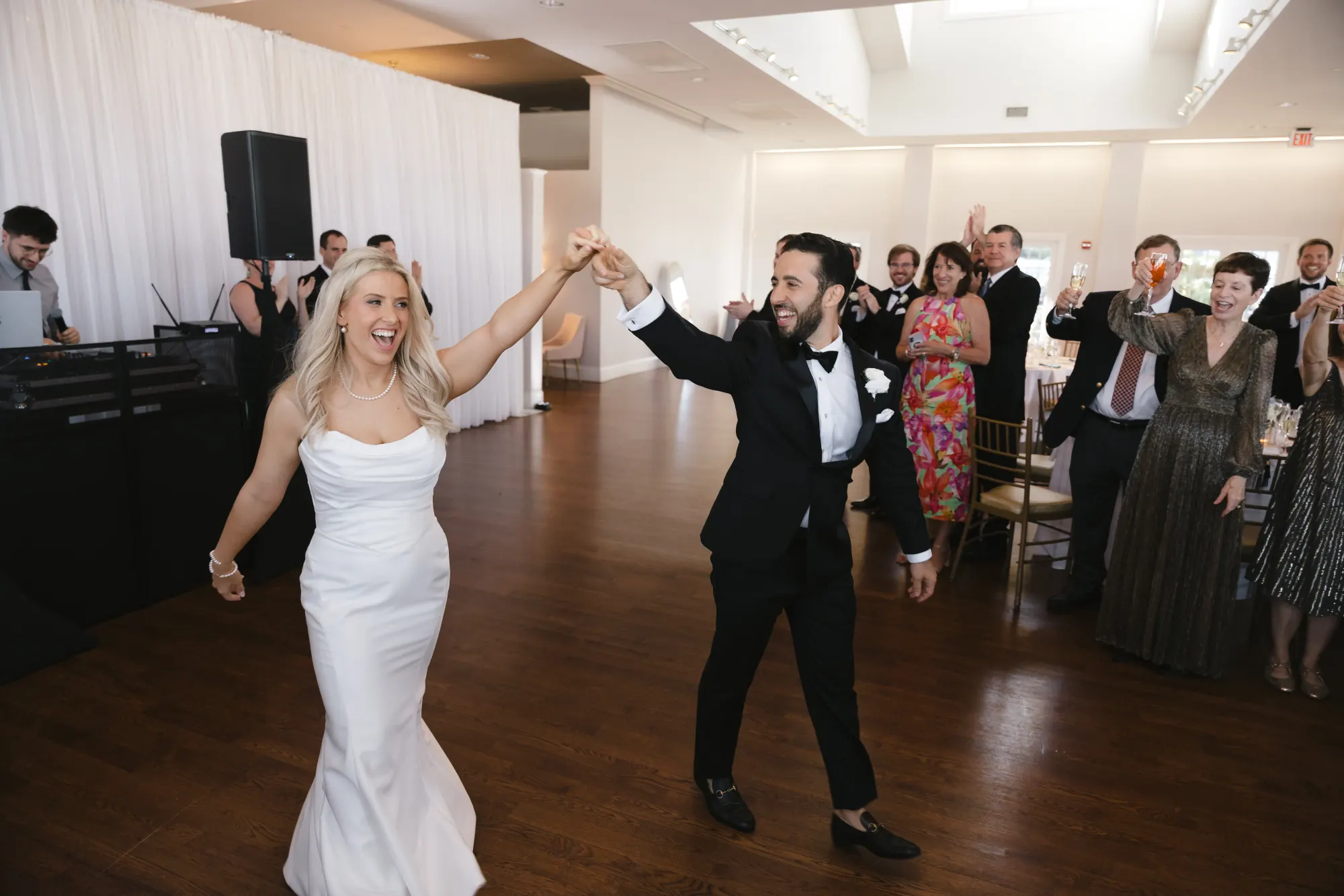 The bride twirls during the first dance in the Cruiseport ballroom