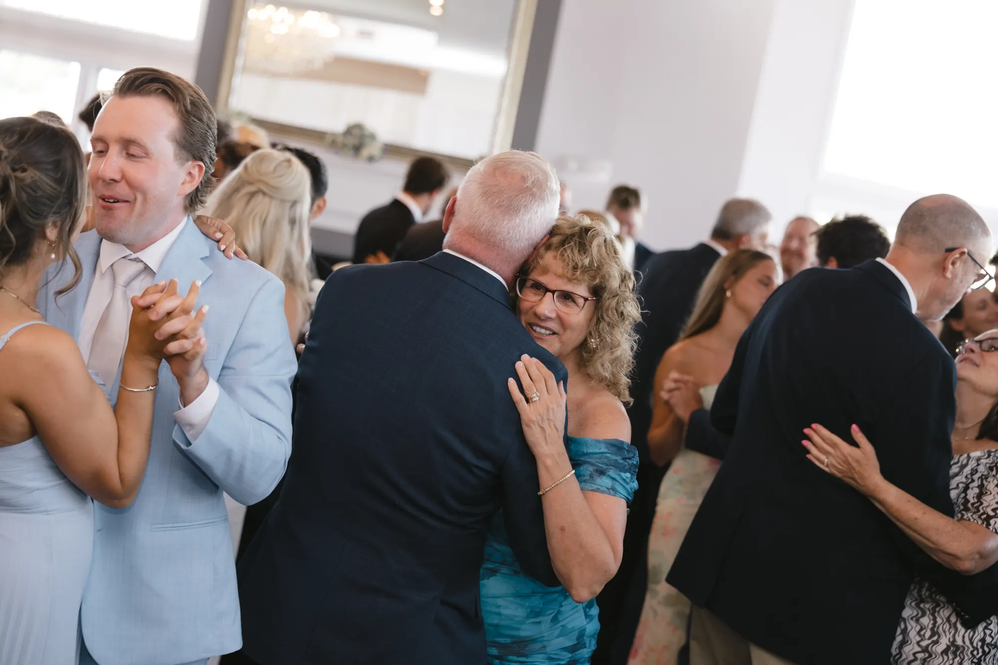 Couples dance together during the Gloucester reception