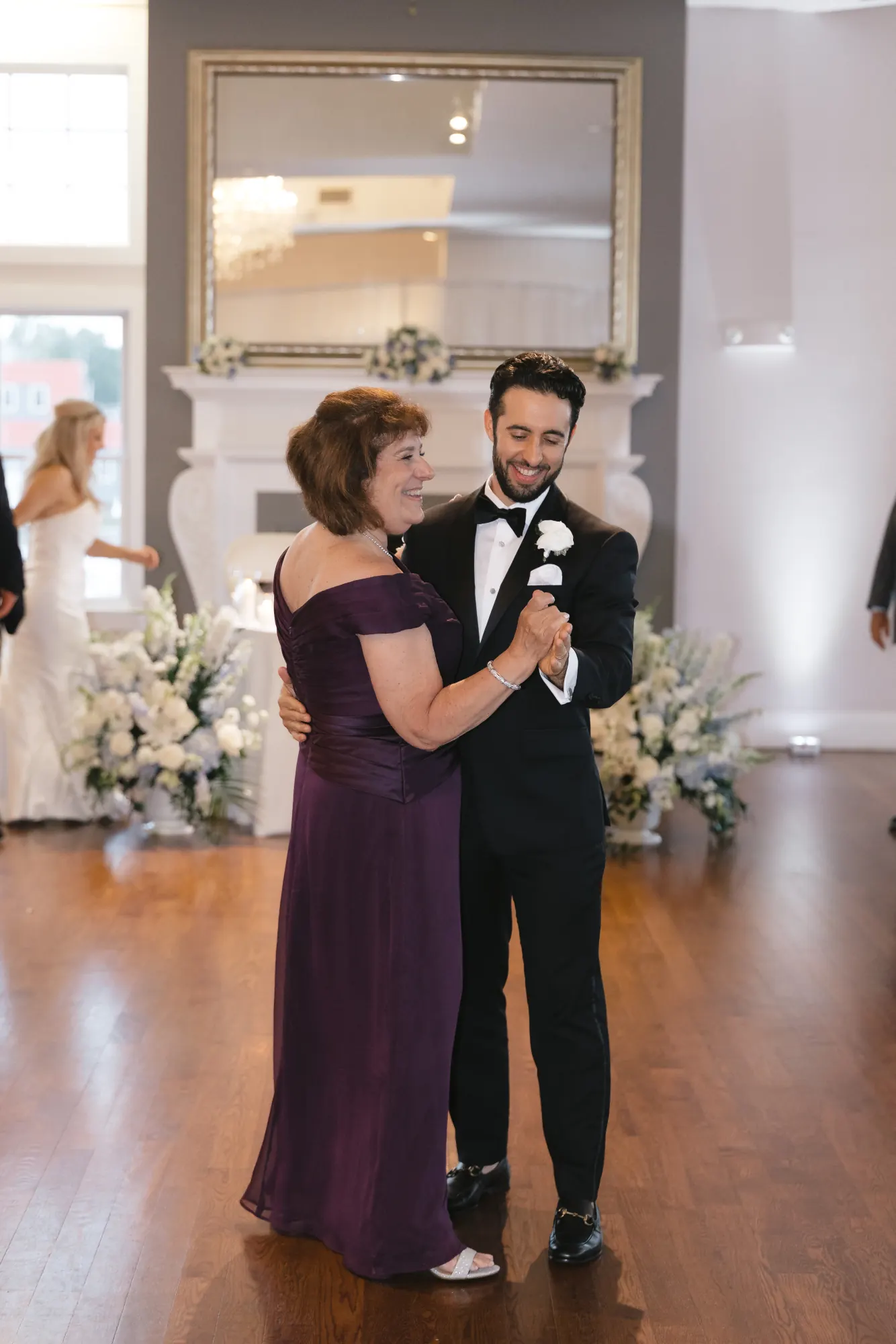 Groom dances with his mother at Cruiseport Gloucester