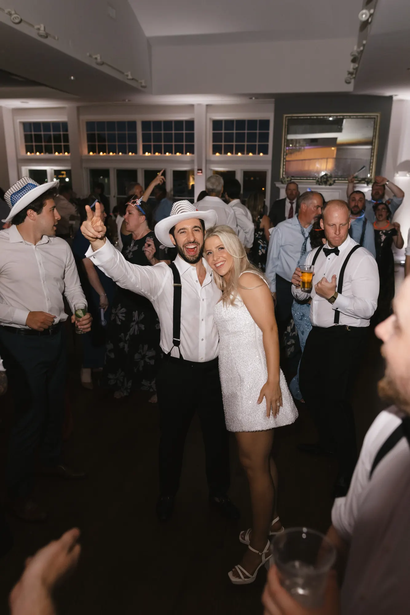 Cowboy hats come out on the dance floor at Cruiseport Gloucester