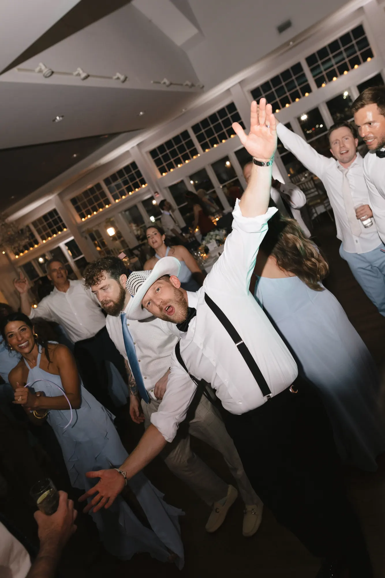 Hands in the air on the dance floor at the Gloucester wedding reception
