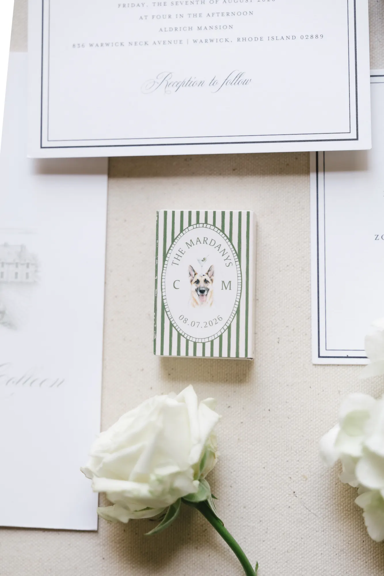 Reception card and custom matchbook with an illustration of the couple's dog