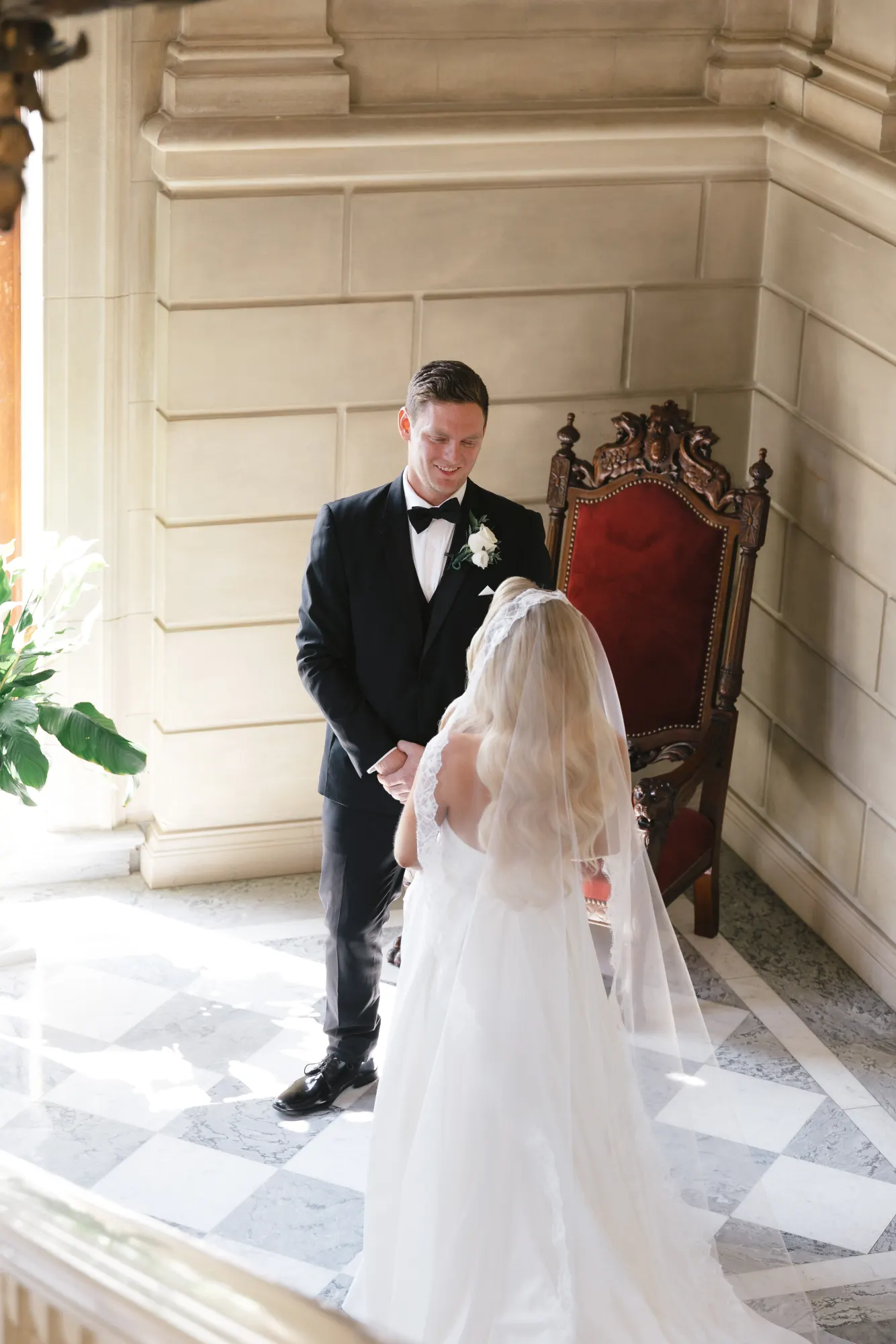 Max takes in the gown during the first look