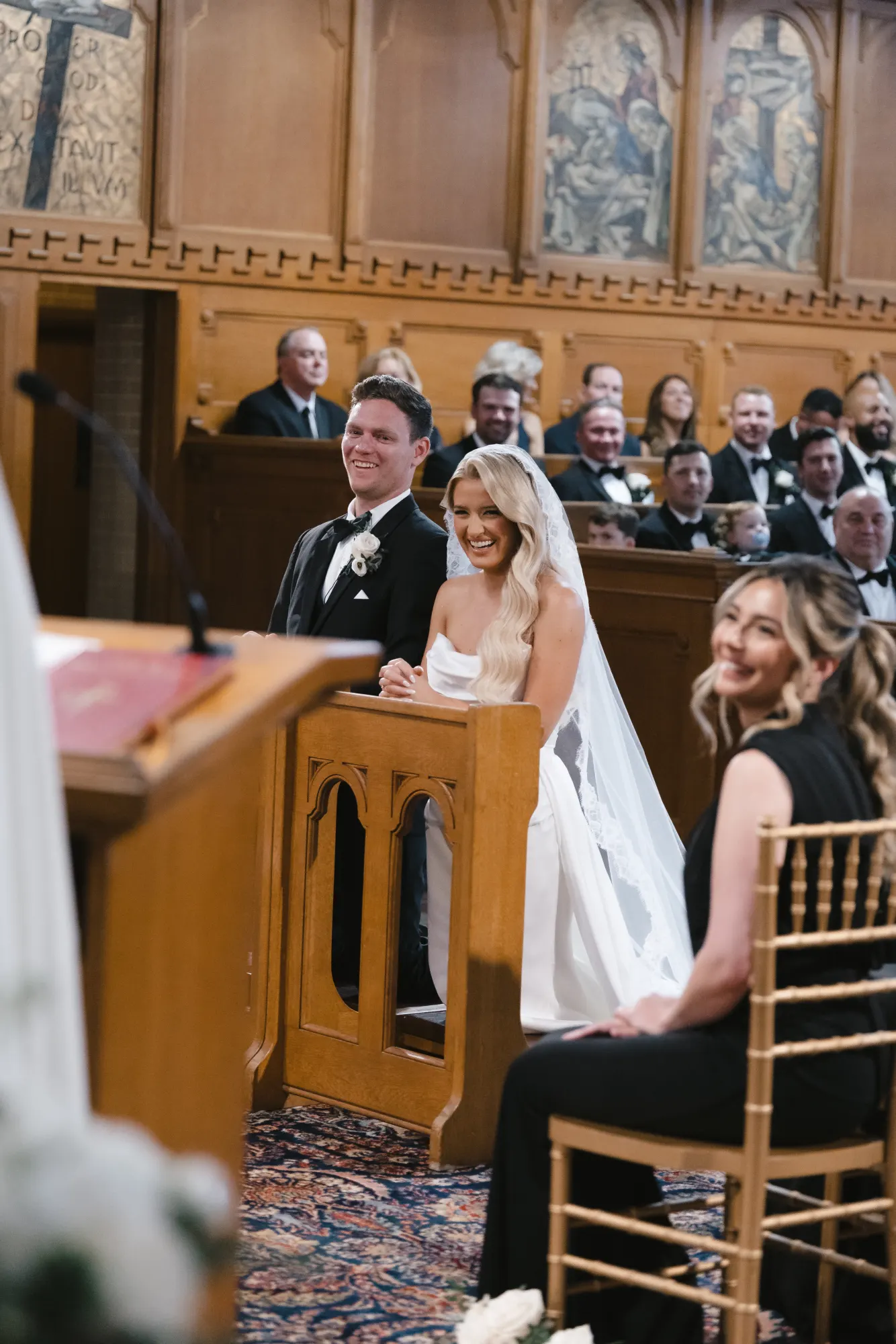 Colleen looks back smiling during the readings