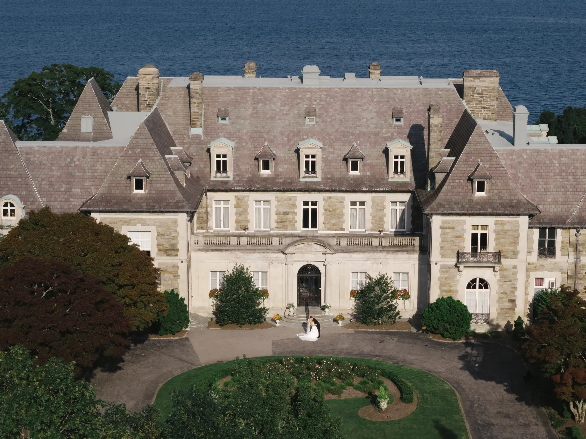 Aerial view of the newlyweds in the front courtyard of Aldrich Mansion on Narragansett Bay