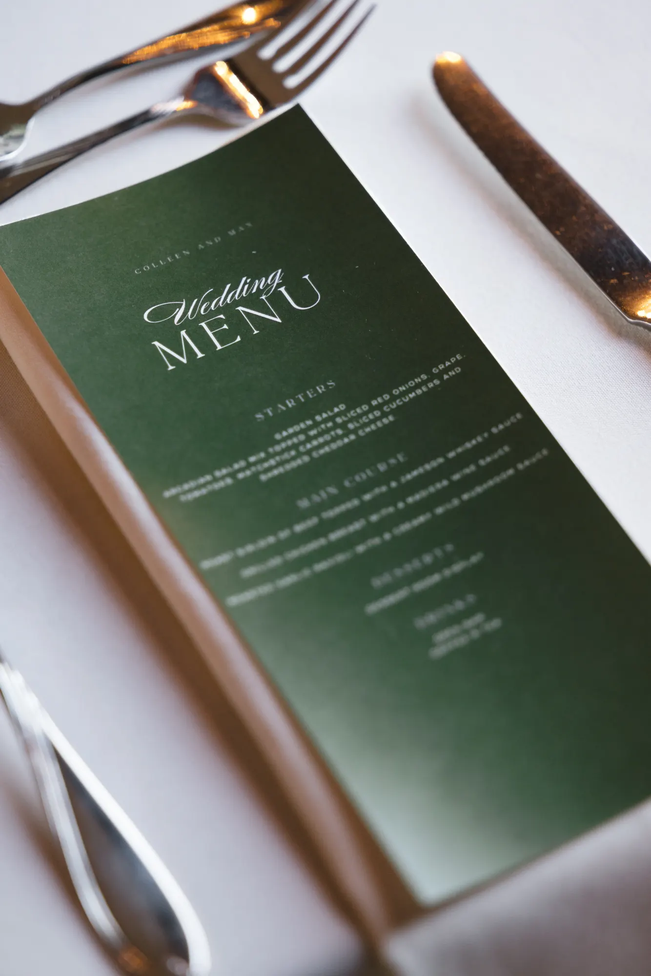 The olive-green wedding menu at each place setting