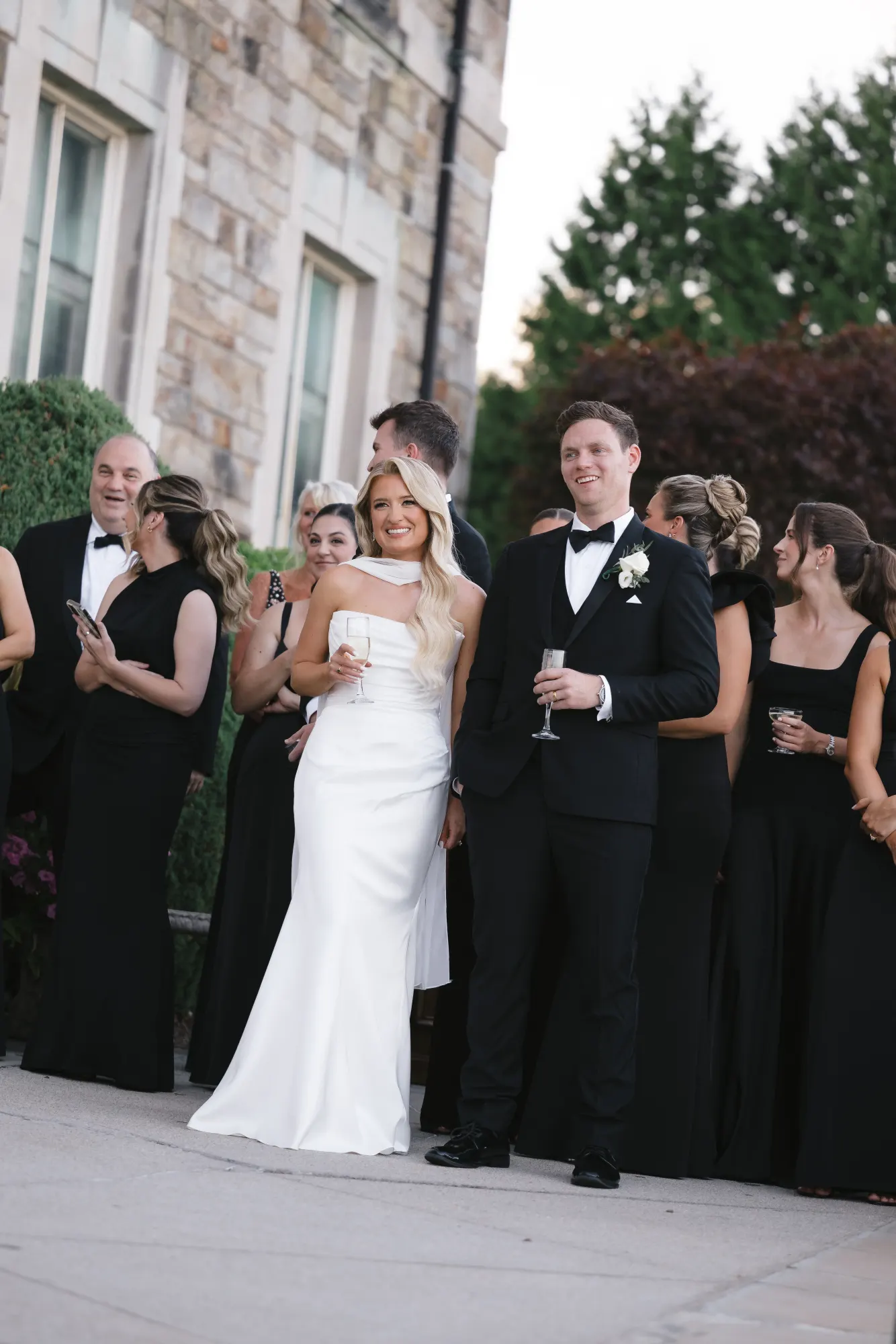Colleen and Max among their wedding party during the toasts