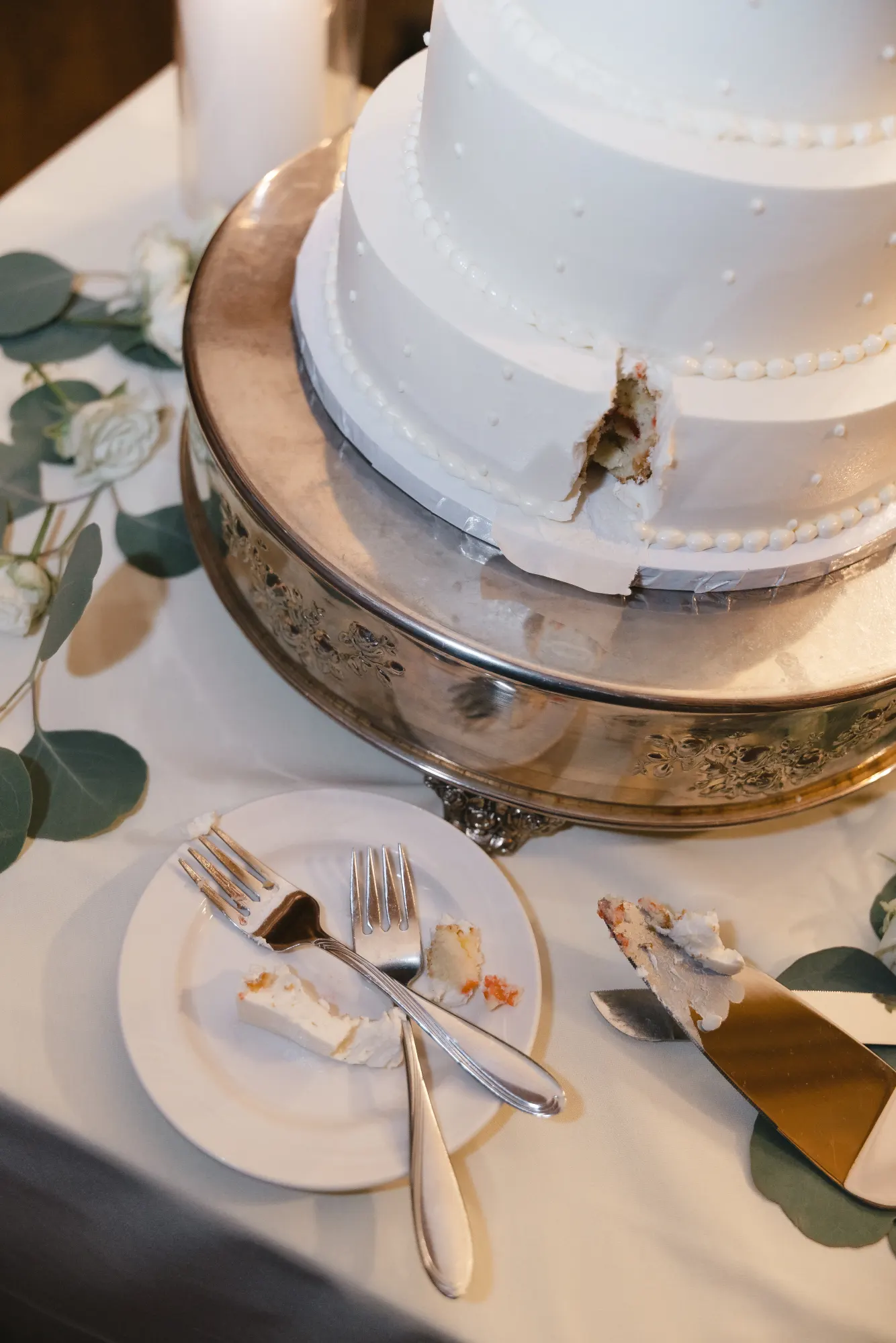 A slice of the wedding cake ready to share