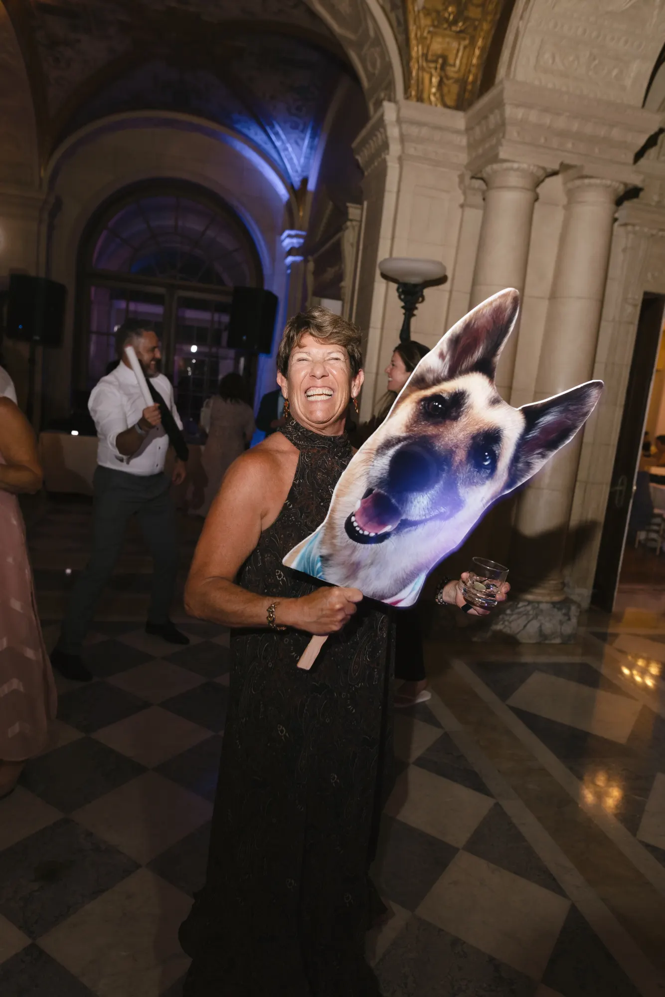 A giant cutout of the couple's dog makes the rounds