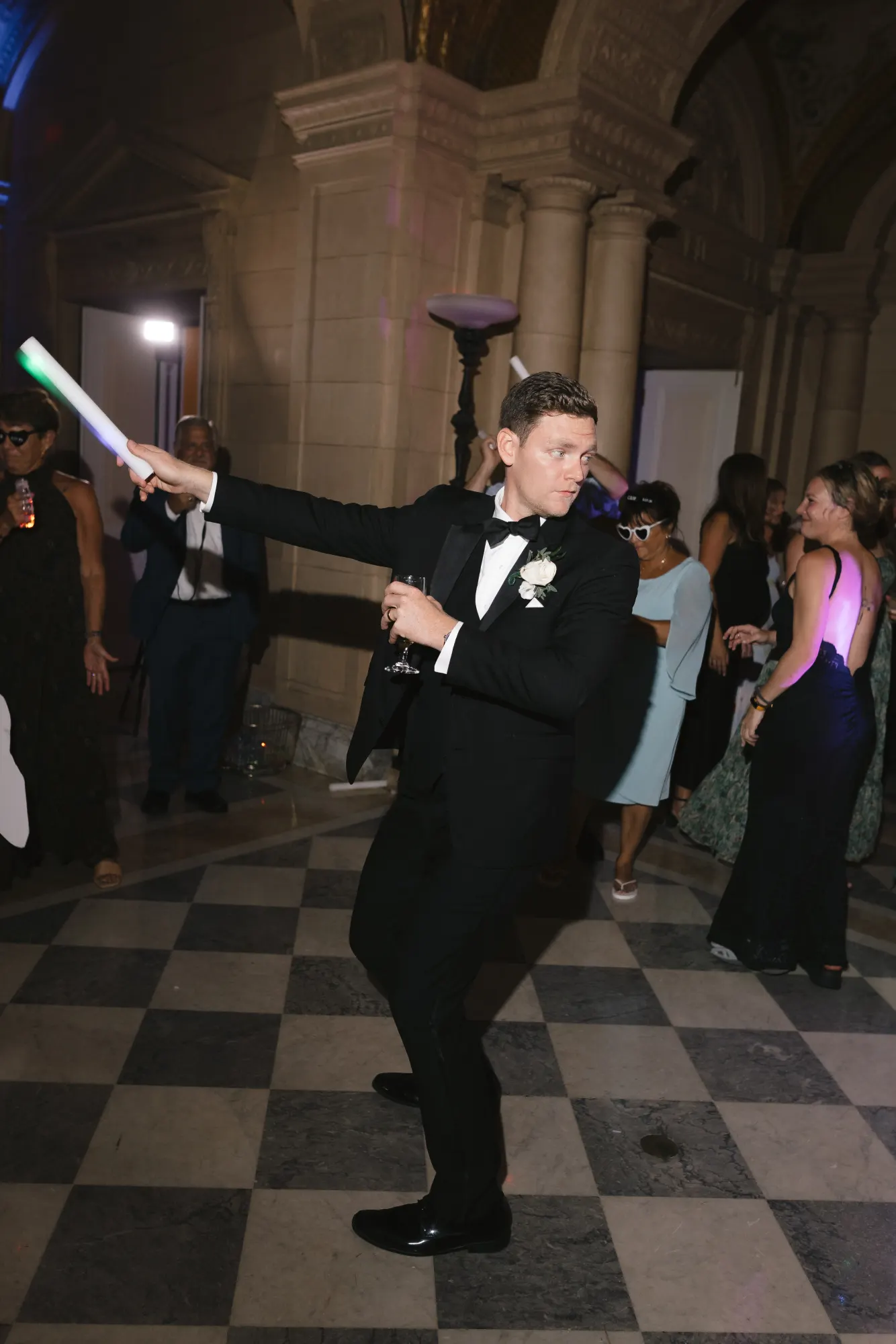 Max leads the charge with glow wands in the great hall