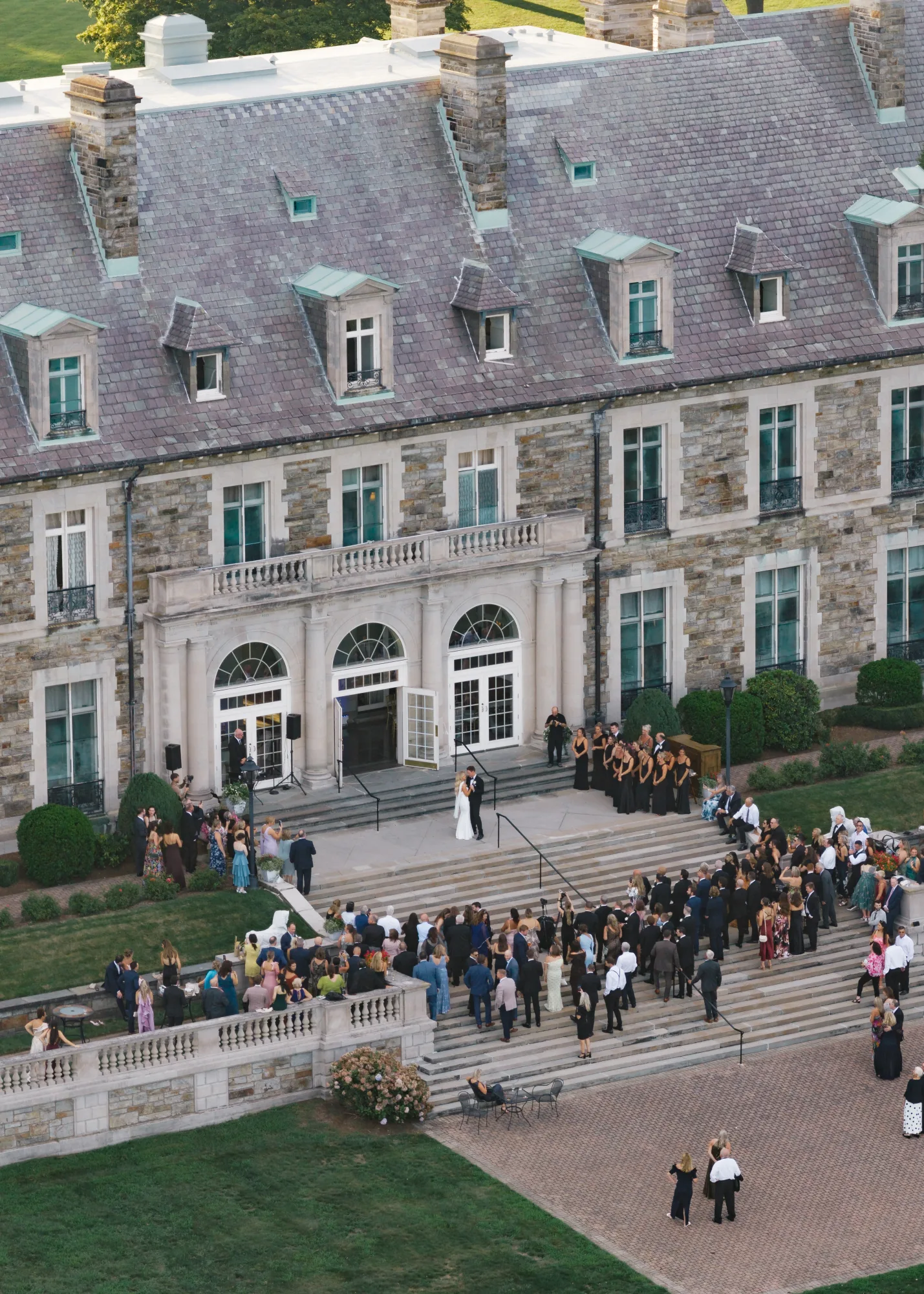 Aerial view of the first dance on the terrace steps of Aldrich Mansion in Warwick, Rhode Island, with 220 guests looking on