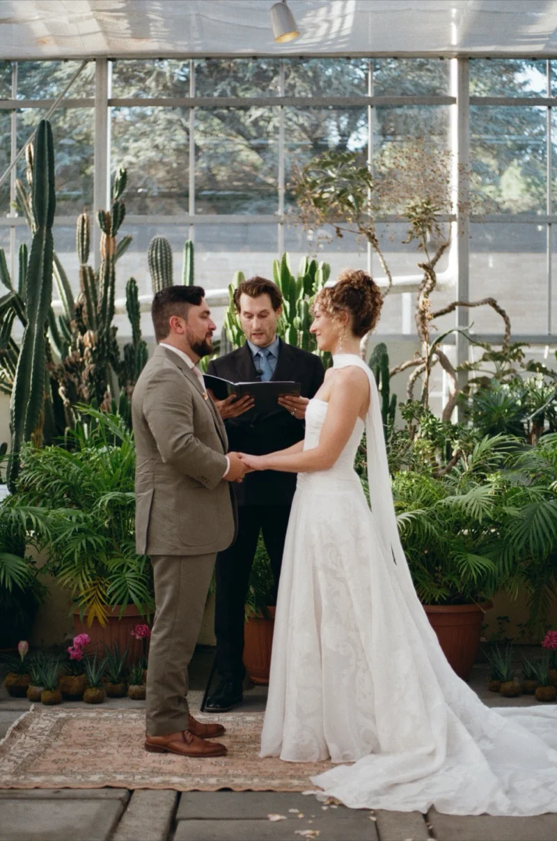 Gabi and Ike first kiss at botanical center ceremony Providence