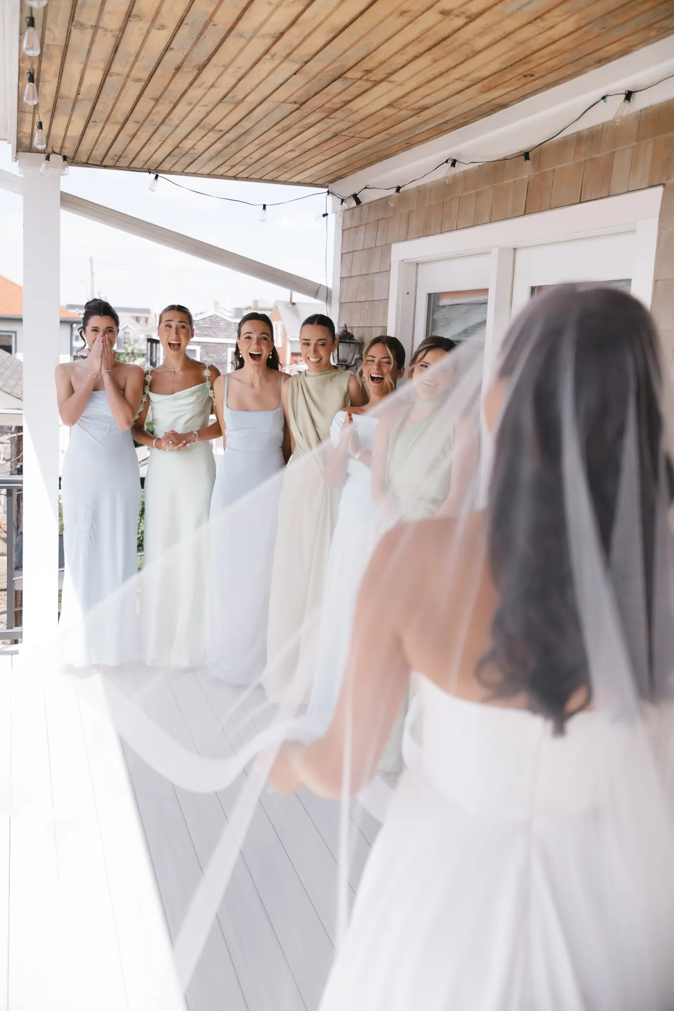 Bridesmaids react to the bride's first look reveal