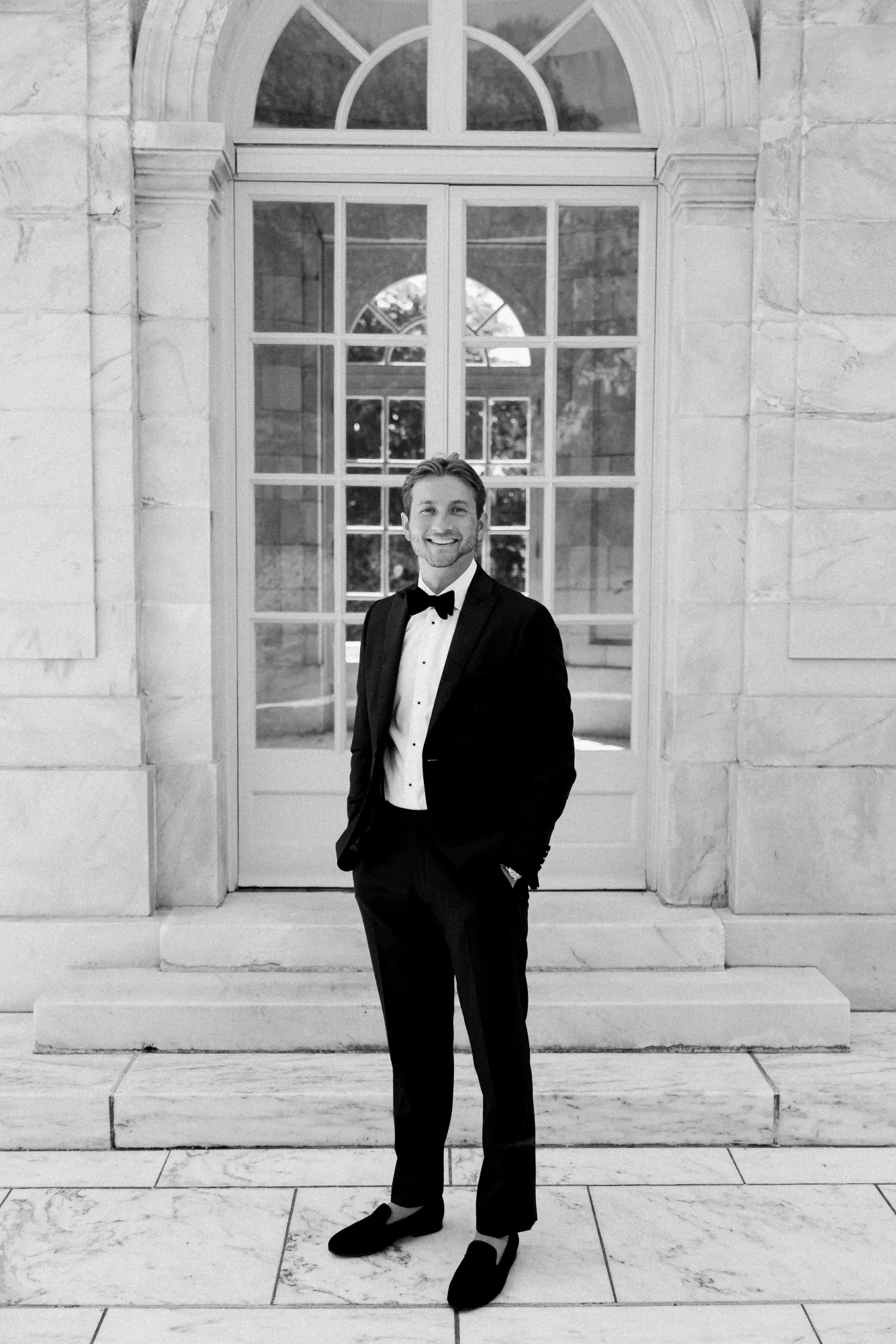 Black and white portrait of the groom at The Elms