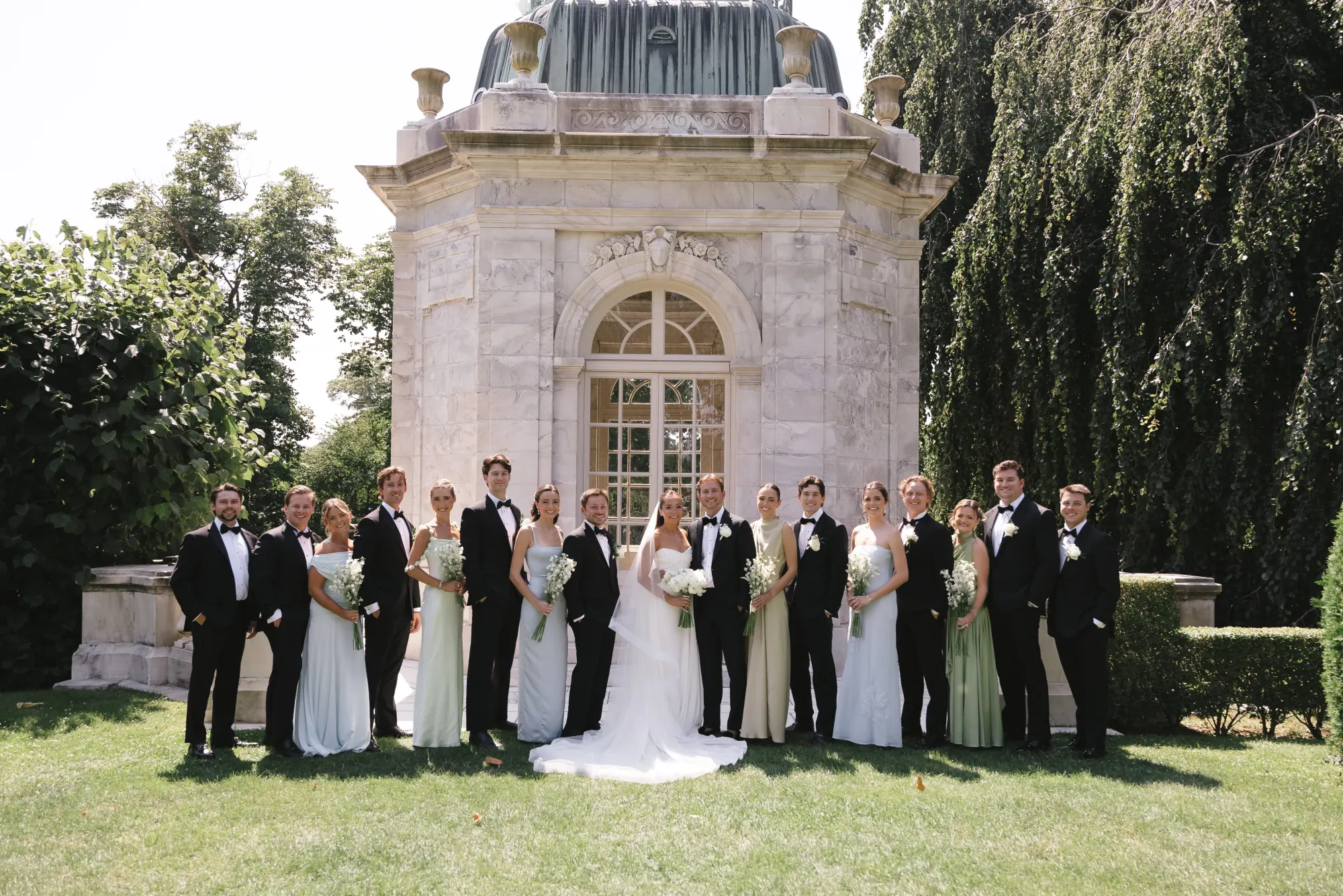 The full wedding party at The Elms teahouse in Newport, Rhode Island