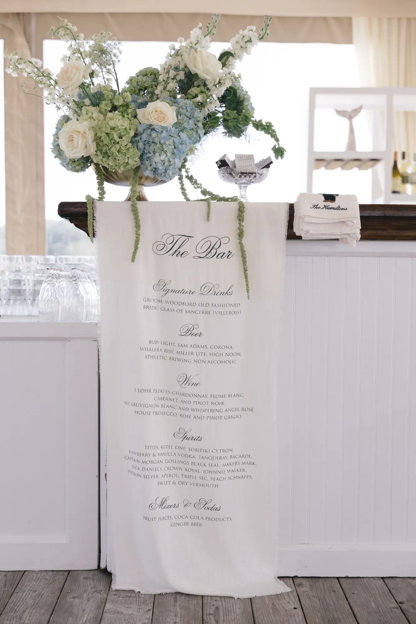 Bar menu sign with blue hydrangea at the OceanCliff reception