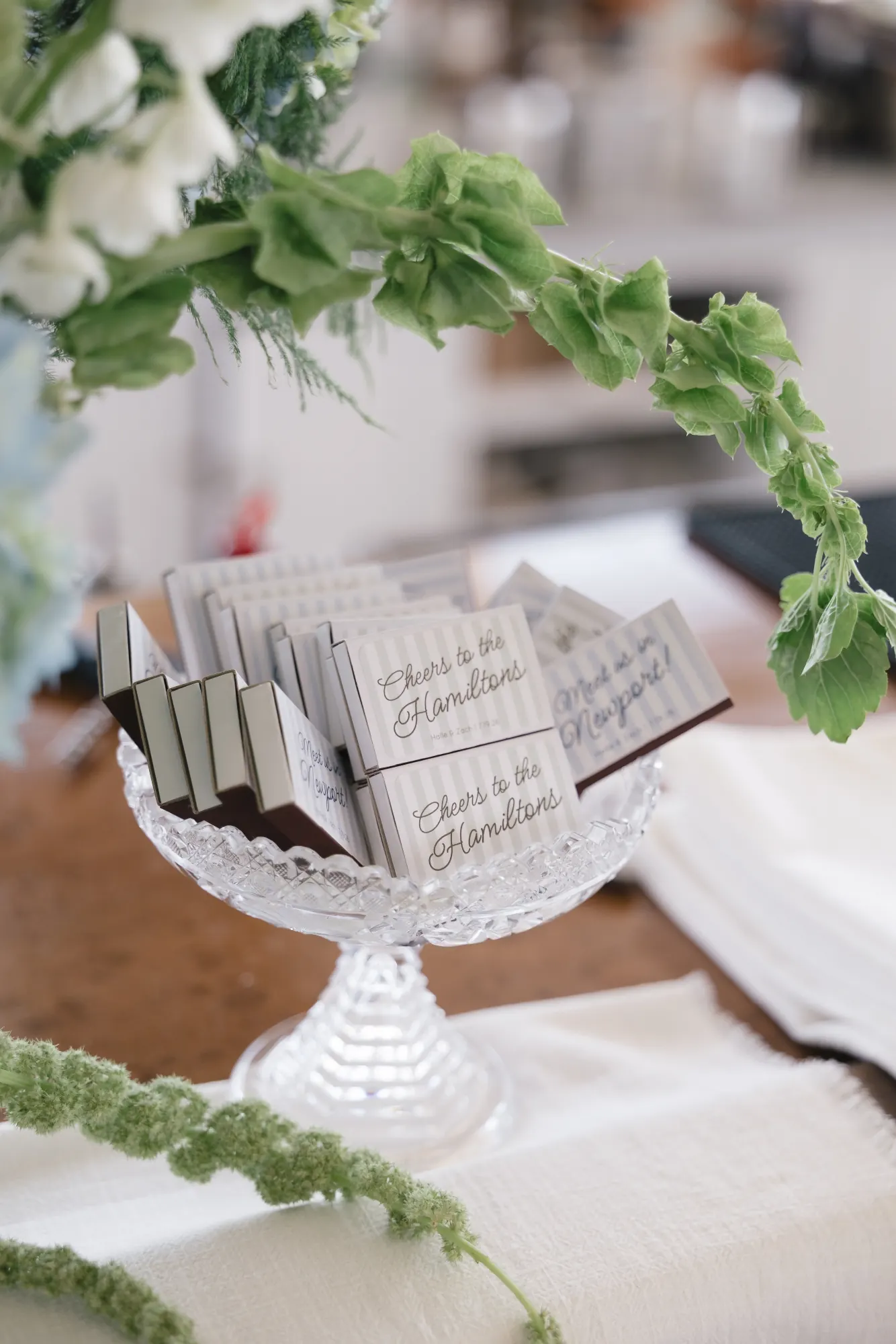 Ceremony programs styled on a glass stand