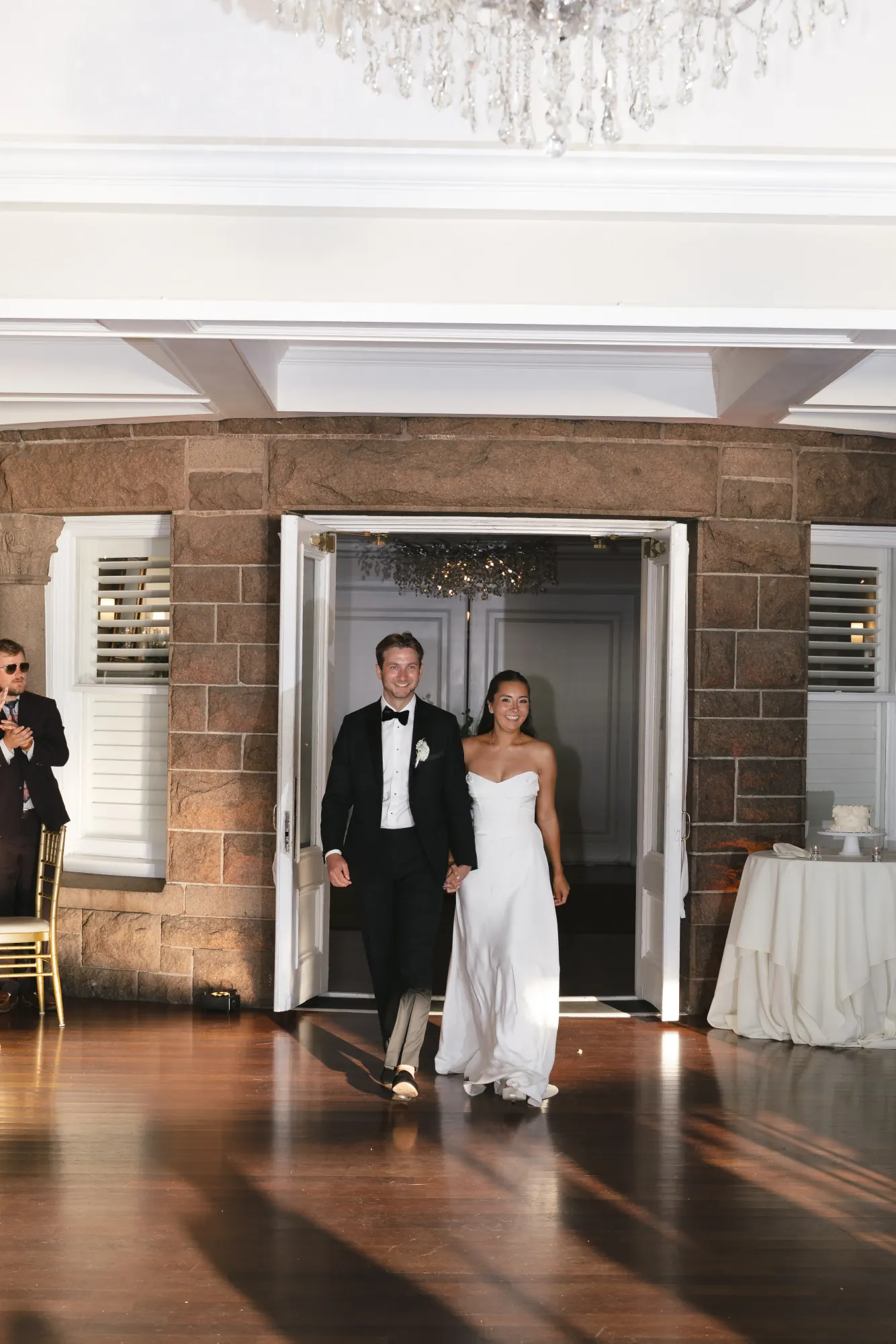 Mr. and Mrs. Hamilton make their grand entrance into the ballroom