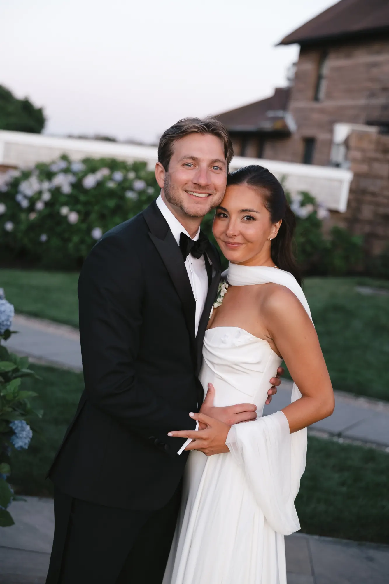 Halle and Zach at golden hour on the OceanCliff grounds