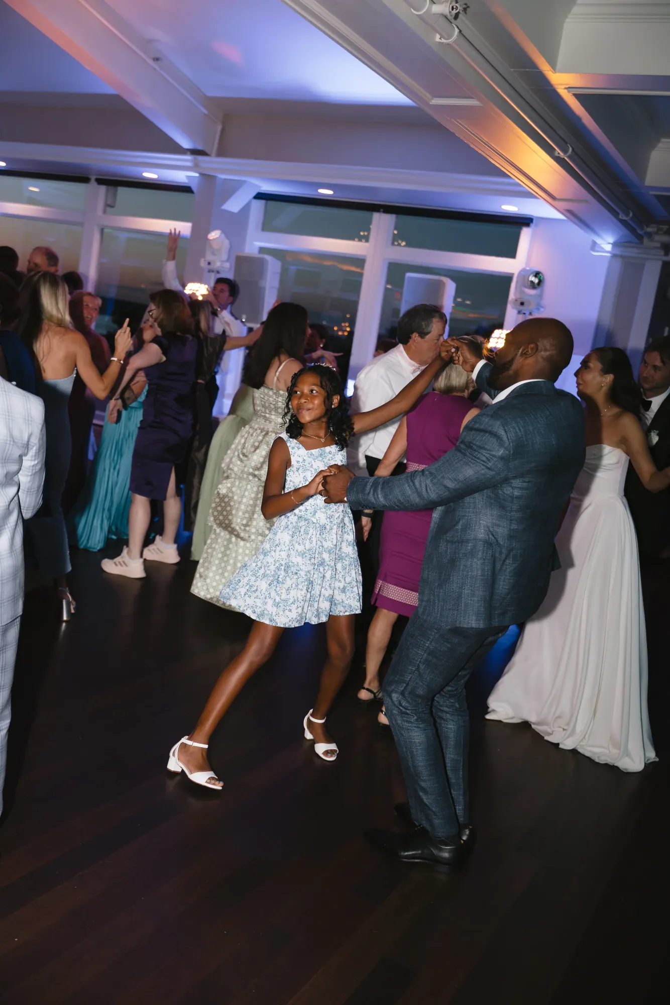 Guests of all ages dance at the OceanCliff reception