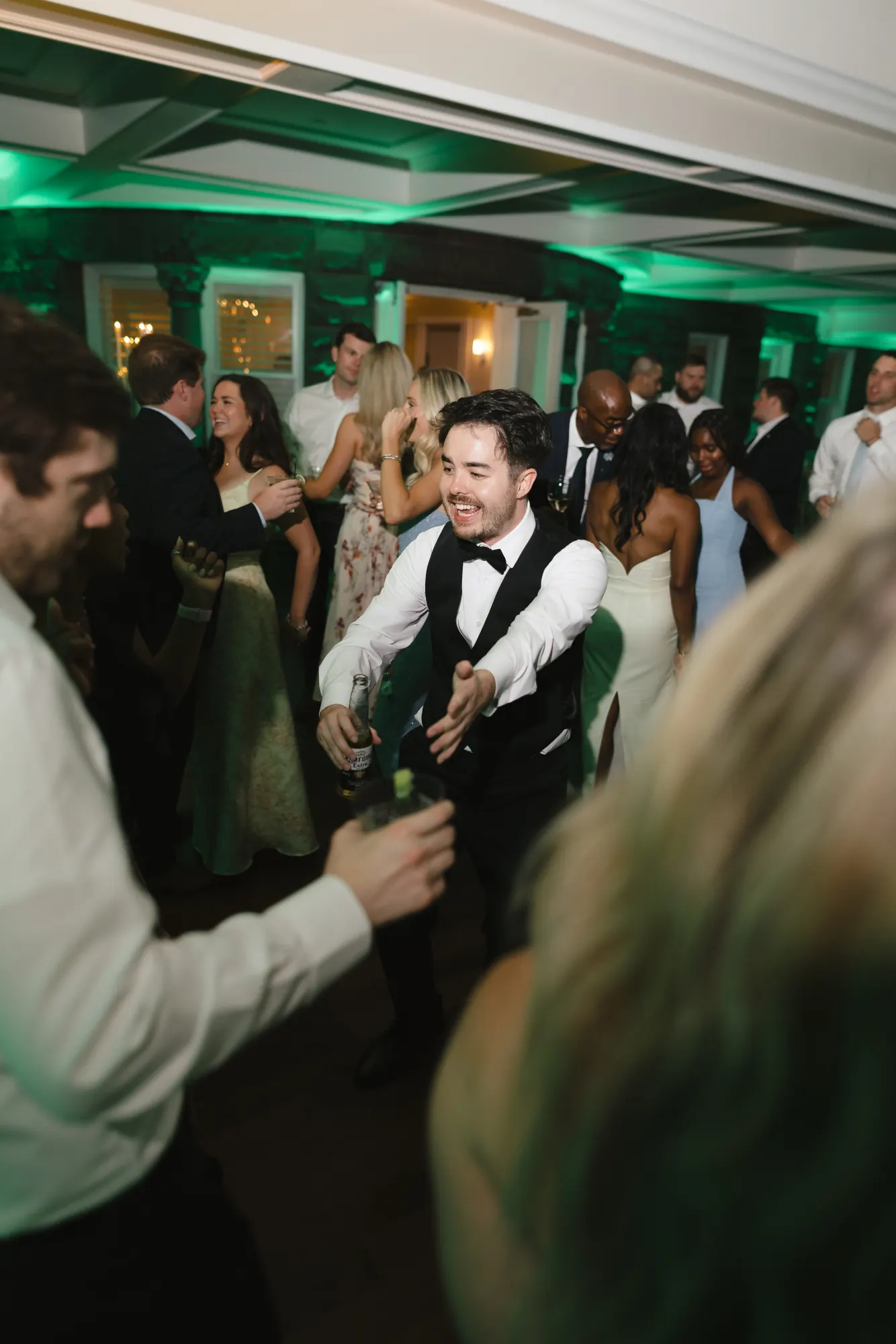 The groom in the thick of the dance floor