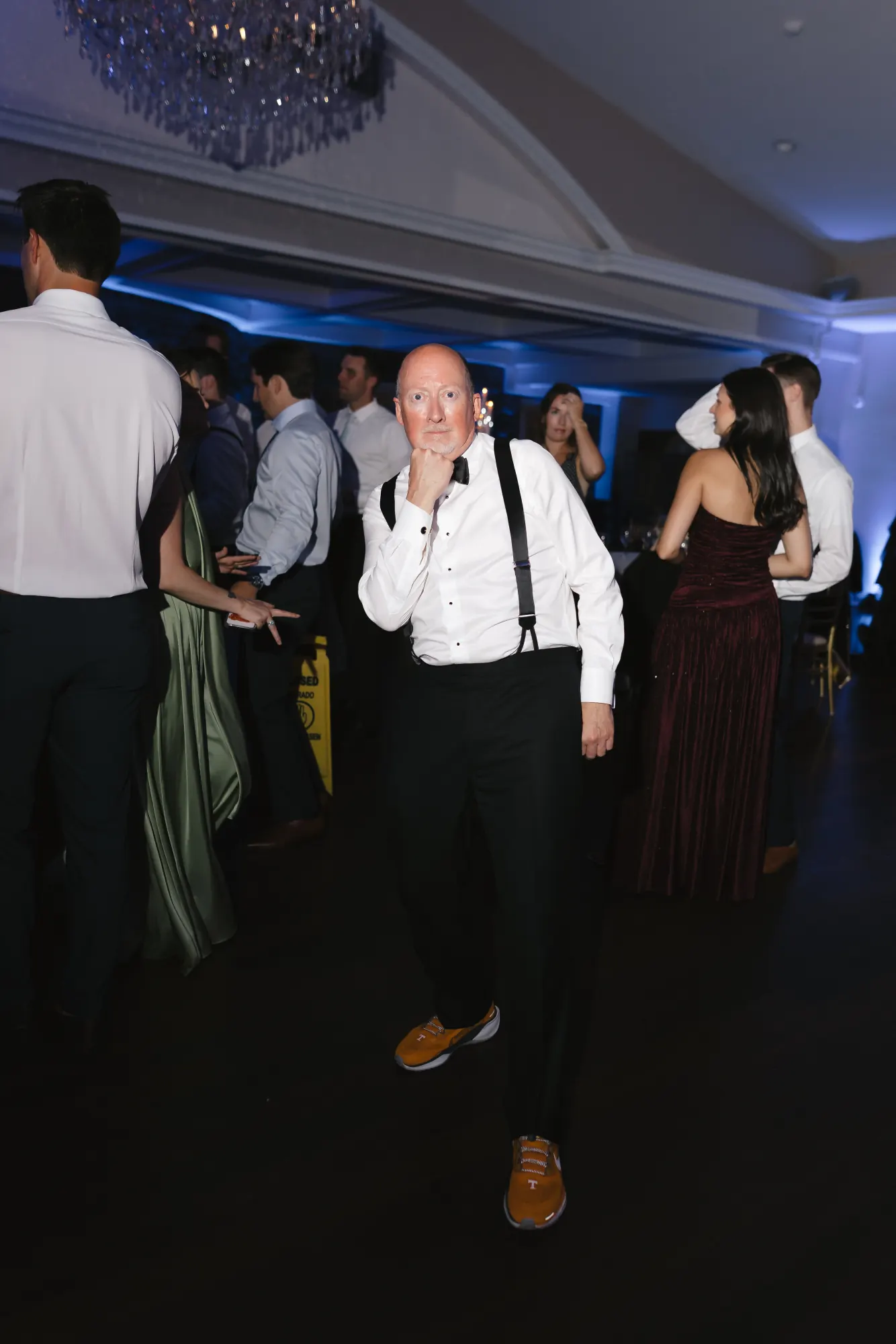 Suspenders off and sleeves rolled on the late-night dance floor