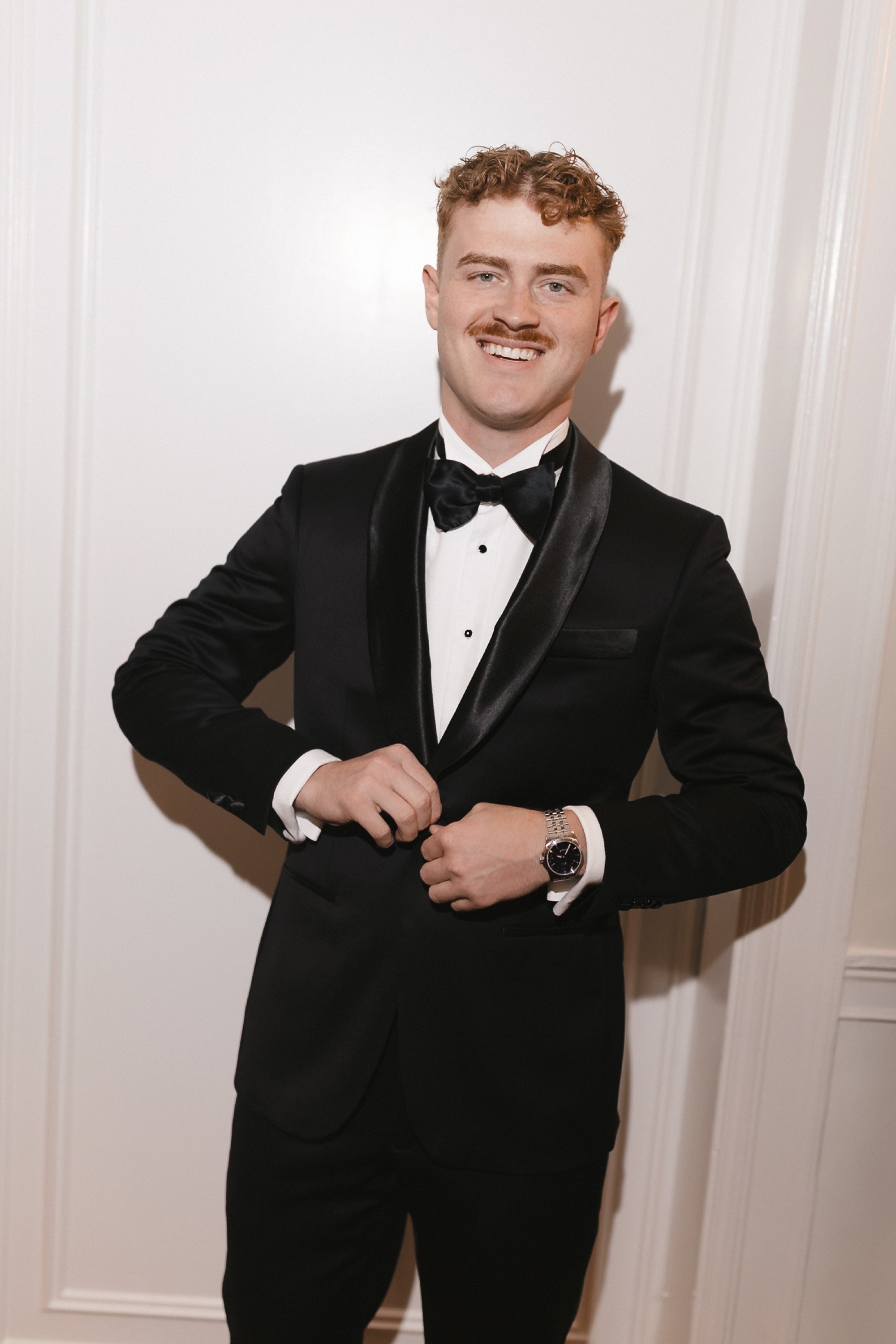 Groom in black tie